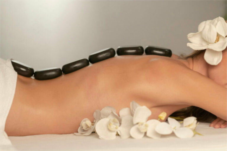 stones along womans back